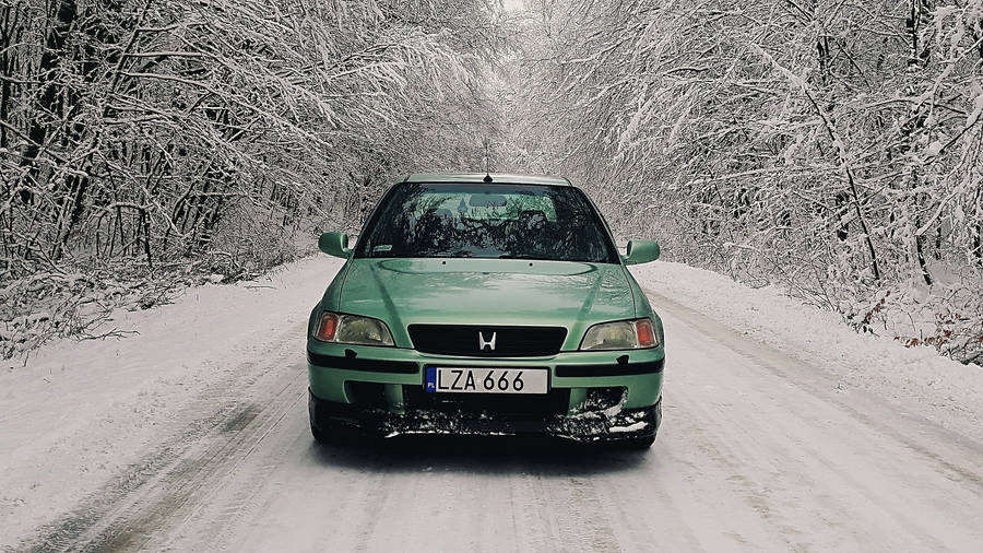 Green 4k Honda Civic In Snow Wallpaper