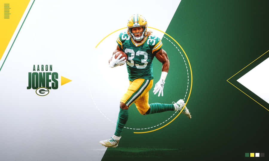 Green Bay Packers Running Back Aaron Jones Reaches For A Touchdown Wallpaper