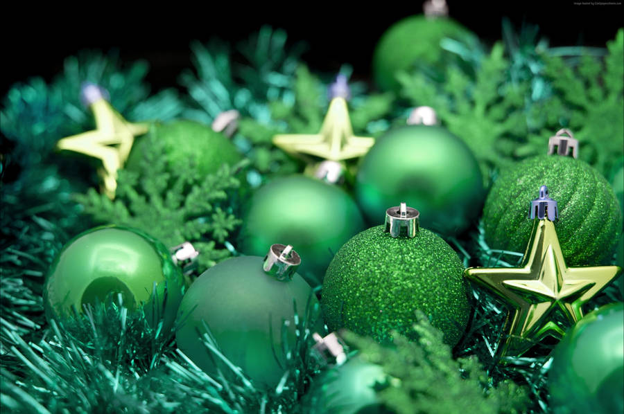 Green Christmas Balls With Stars Wallpaper