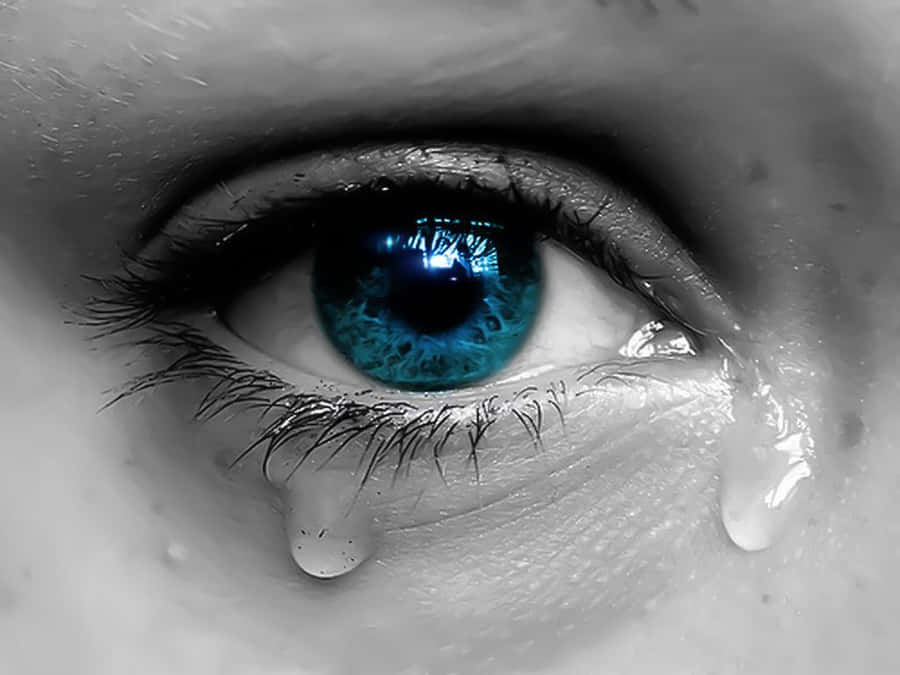 Greyscale Blue Eye Crying With Tears Wallpaper
