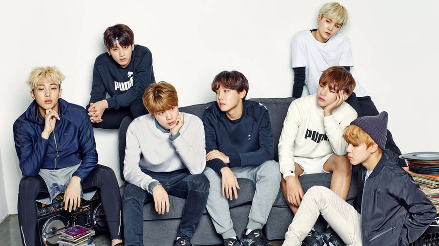 Group Bts On Couch Blue And White Wallpaper