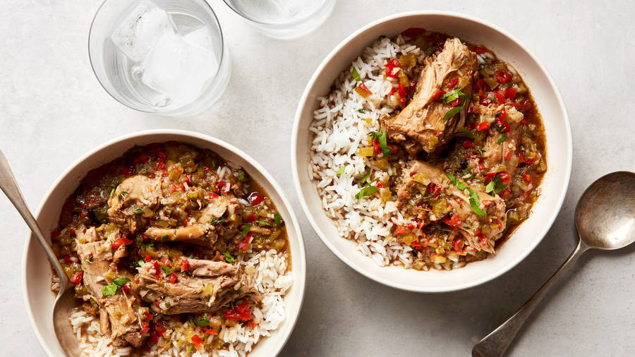 Gumbo Plates With Rice And Water Glasses Wallpaper