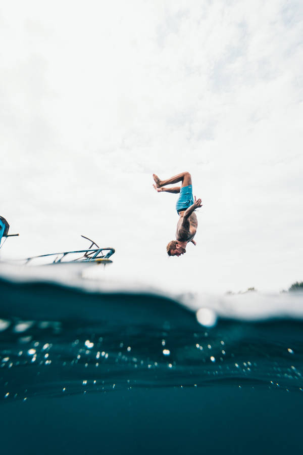 Guy Backflip On Vacation Wallpaper