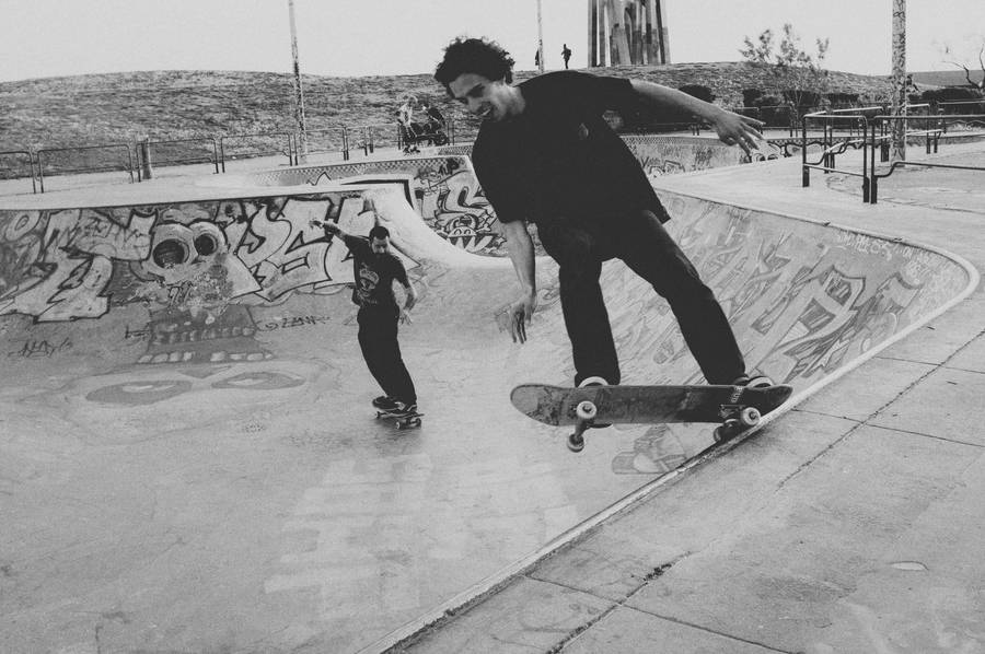 Guys In Skateboards Black And White Wallpaper