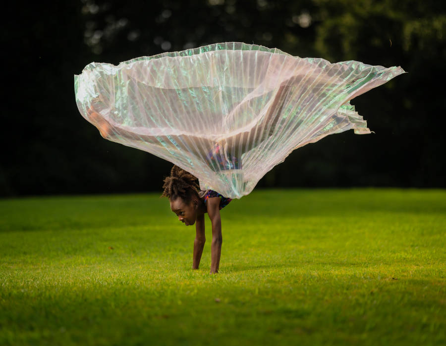 Gymnastics Upside Down Green Field Wallpaper