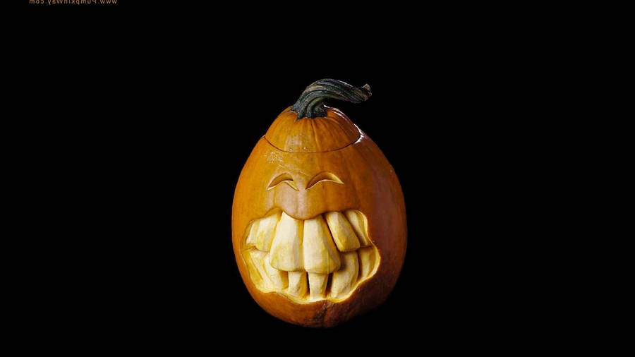 Halloween Aesthetic Big Teeth Pumpkin Wallpaper