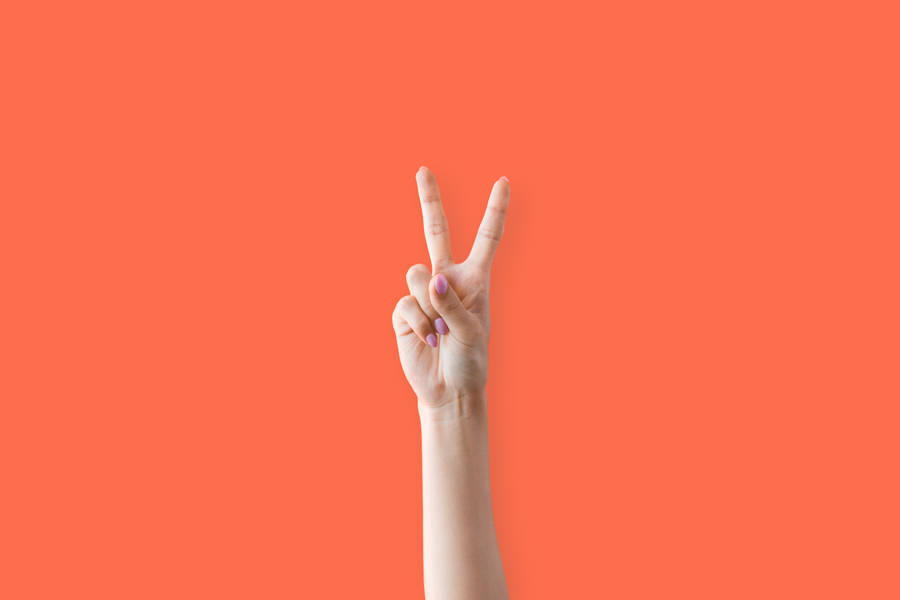 Hand Doing Peace Symbol Wallpaper