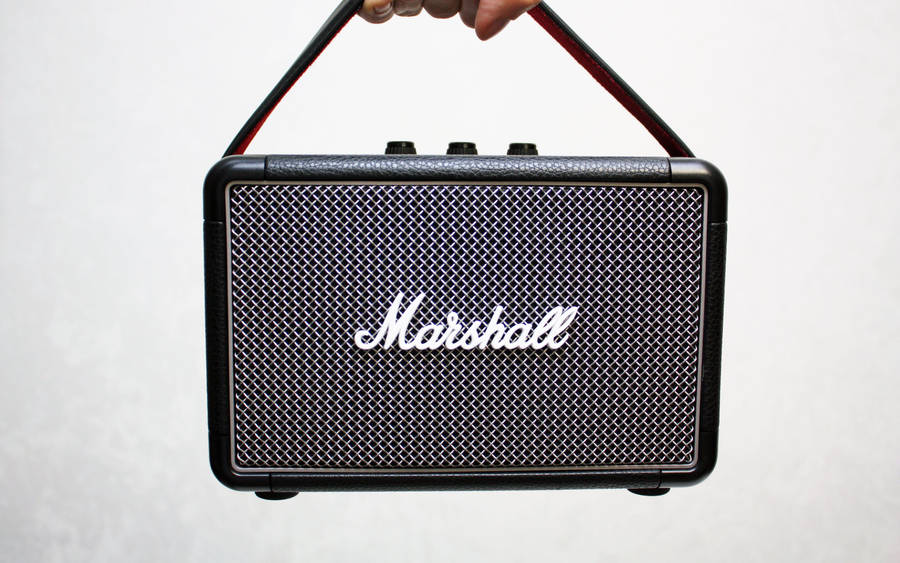 Hand Lifting Marshall Amplifier Wallpaper