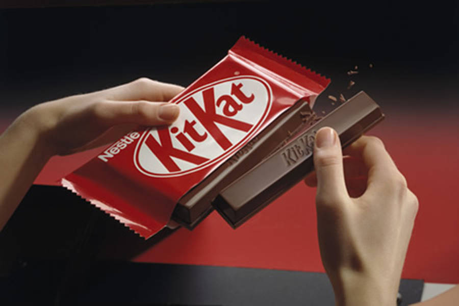 Hands Breaking Kit Kat Wallpaper