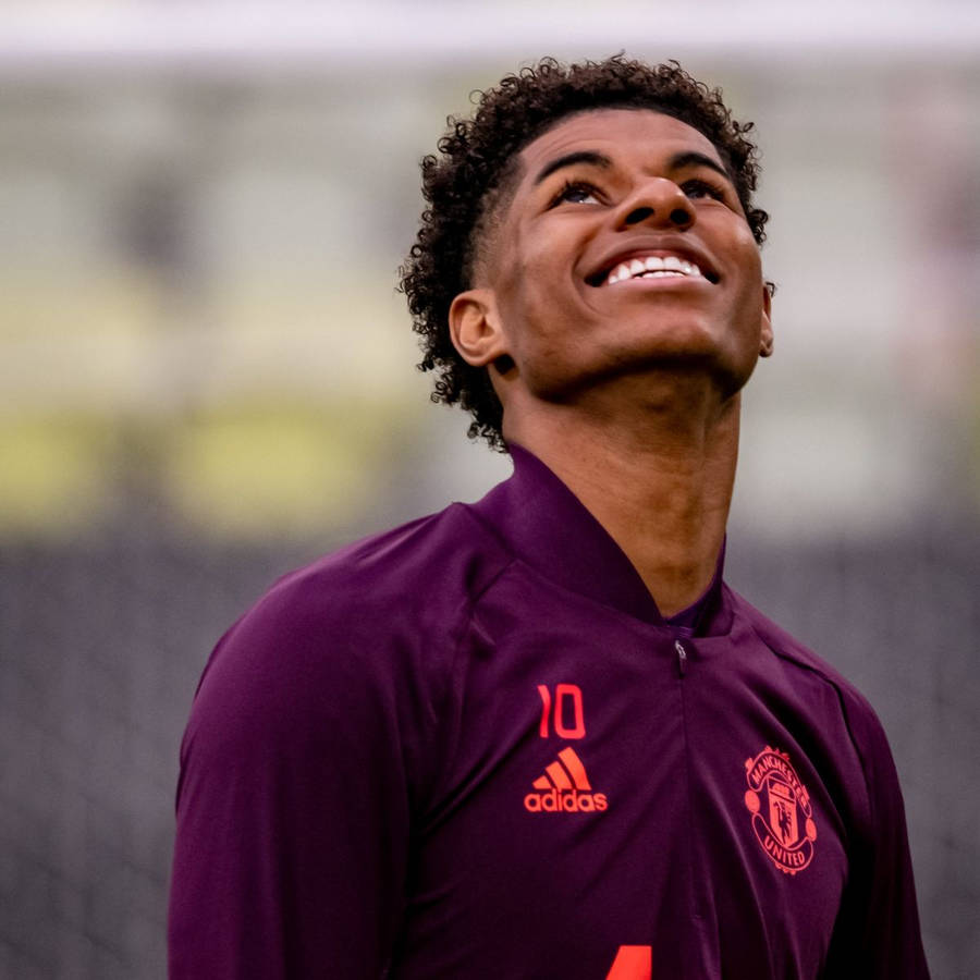 Handsome Marcus Rashford Smiling Wallpaper