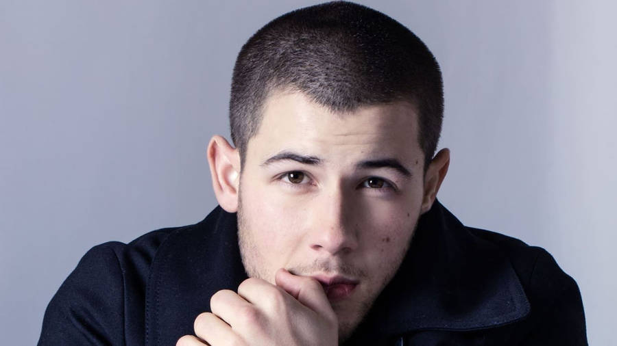 Handsome Musician Nick Jonas Wallpaper