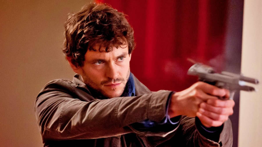 Hannibal Will Shooting A Gun Wallpaper