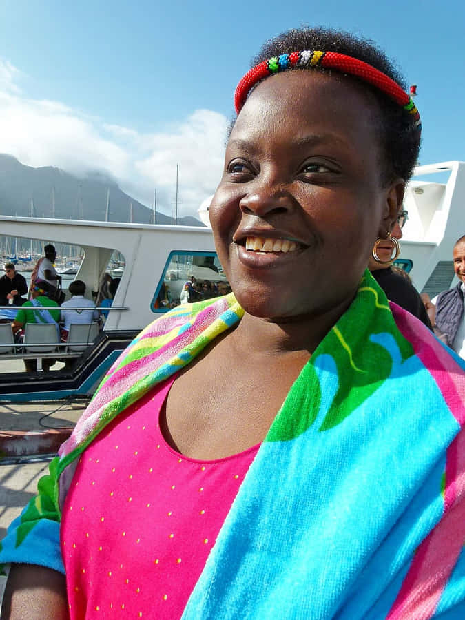 Happy South African Woman With Colorful Scarf Wallpaper