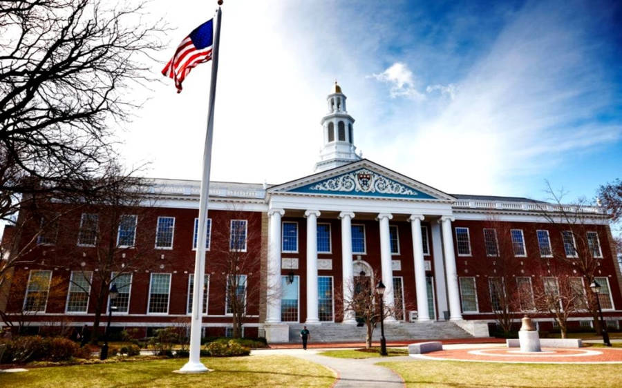 Harvard University With Waving Us Flag Wallpaper