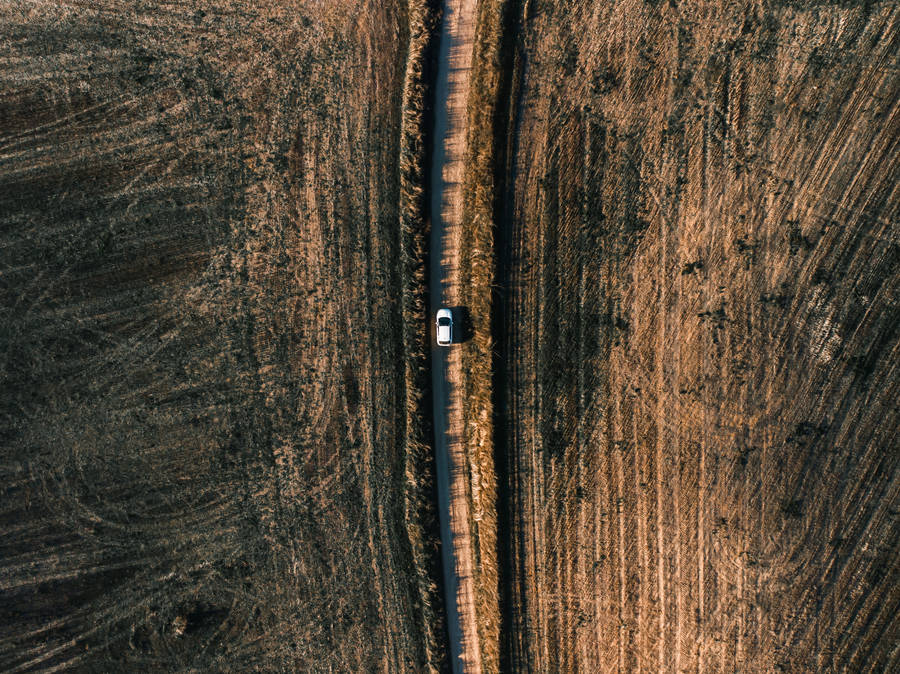 Hd Car On Dirt Aerial View Wallpaper