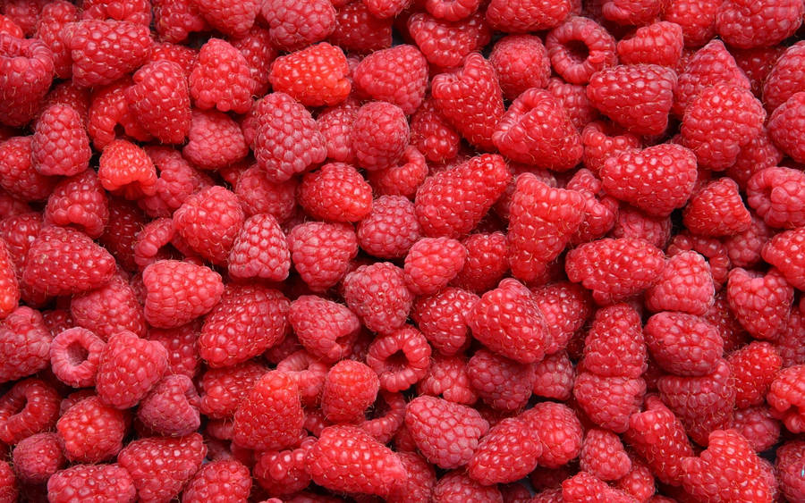 Heap Of Red Raspberries Wallpaper