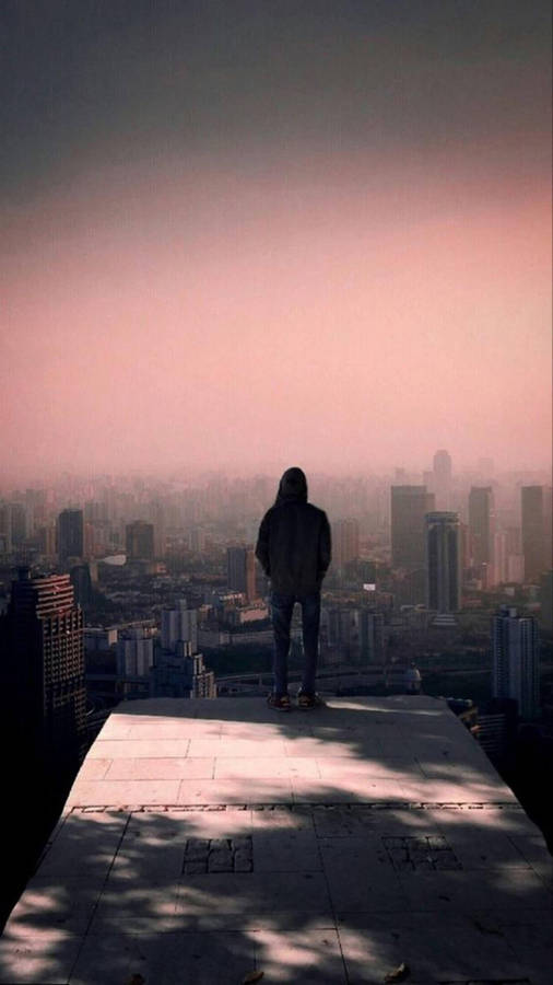 Heartbroken Youngster Reflecting Amid Solitude Wallpaper