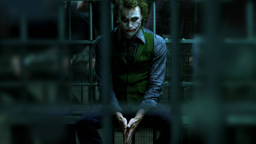 Heath Ledger Joker Behind Bars Wallpaper