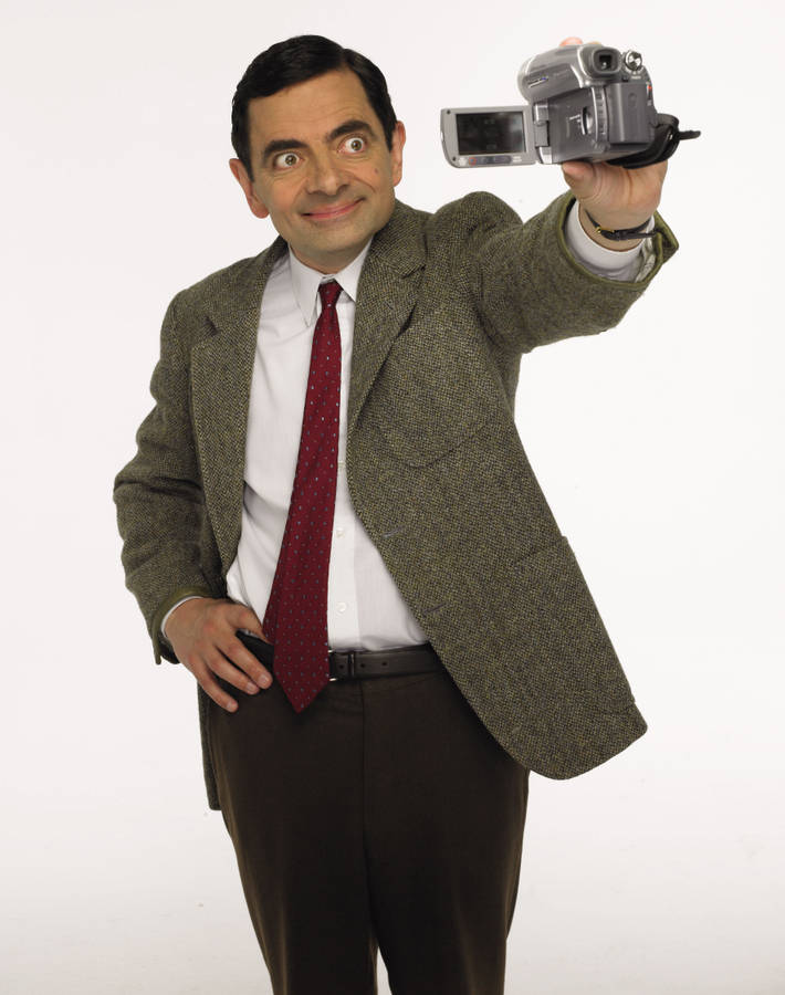 High Definition Image Of Mr. Bean With 4k Video Camera Wallpaper