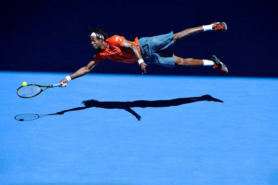 High-flying Gael Monfils In Action Wallpaper