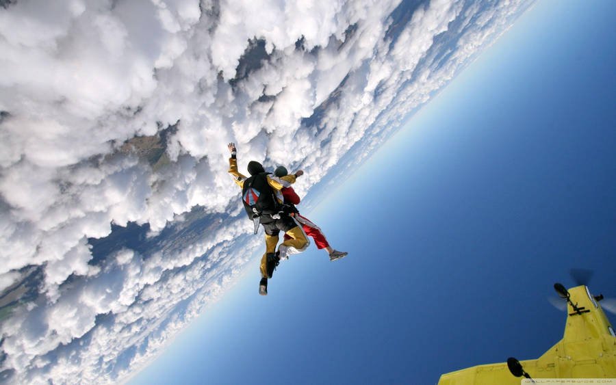 High-intensity Skydiving Adventure With Gopro Wallpaper