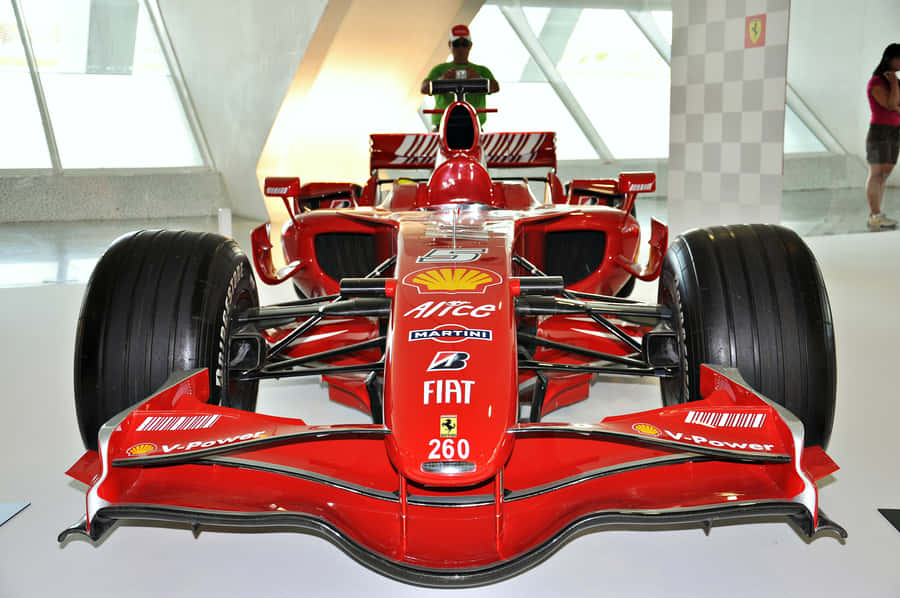 High-speed Thrill - A Formula 1 Race Car In Action Wallpaper