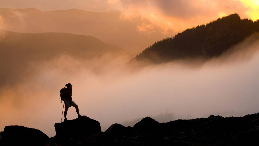 Hiking On Foggy Mountain Wallpaper