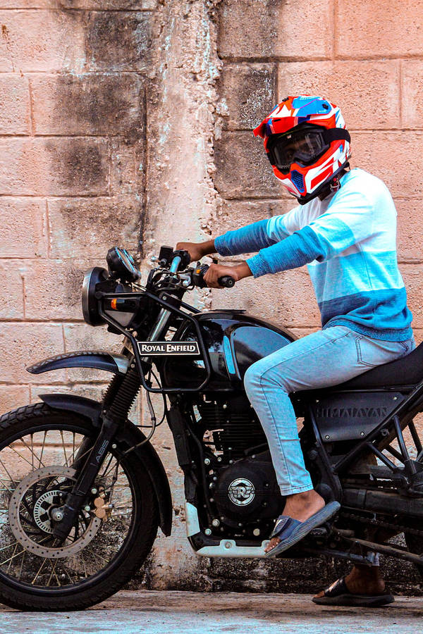 Himalayan Bike And Brick Building Wallpaper