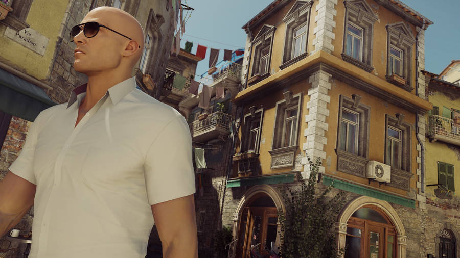 Hitman In White Polo Shirt Wallpaper