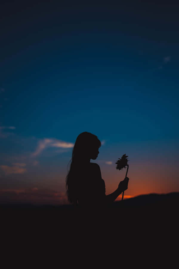 Holding A Flower For Girls Wallpaper