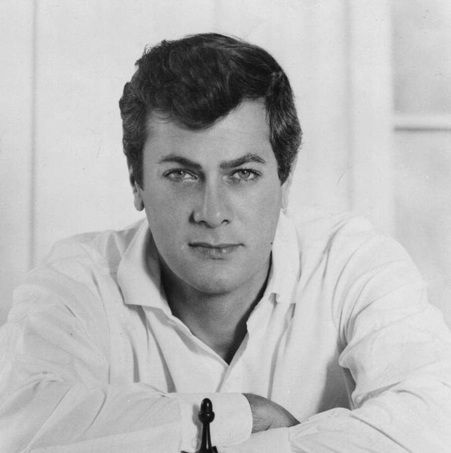 Hollywood Legend Tony Curtis In Expressive Black And White Portrait. Wallpaper