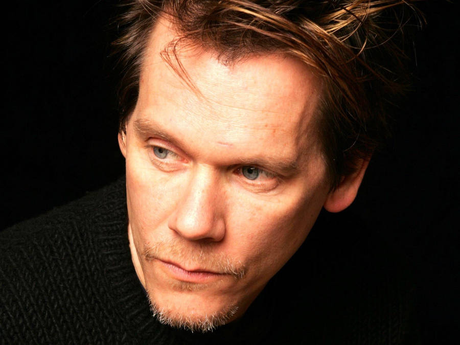 Hollywood Veteran Kevin Bacon In A Classic Black Suit Wallpaper