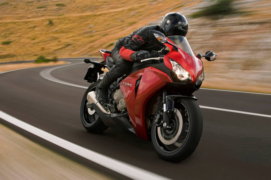 Honda Fireblade Red Bike In Action Wallpaper