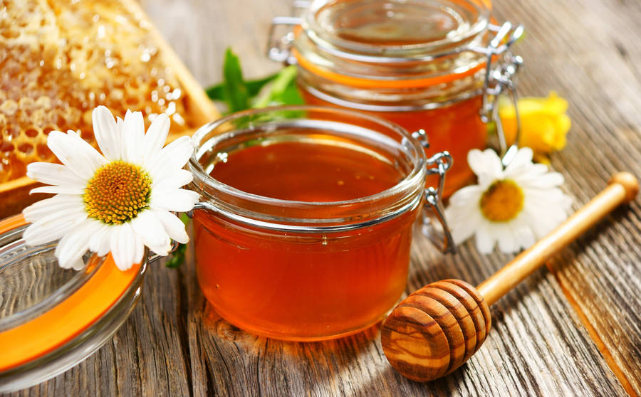 Honey Jars With White Flowers Wallpaper