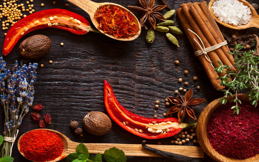 Hot Spices For Cooking On Wooden Surface Wallpaper