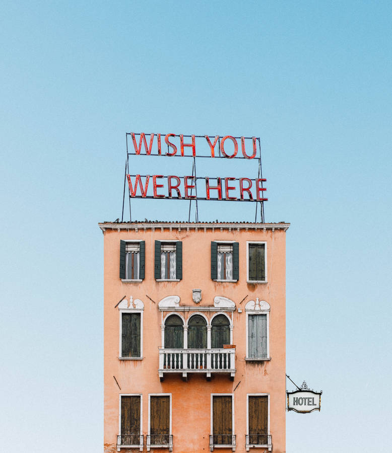 Hotel With Building Sign Wallpaper