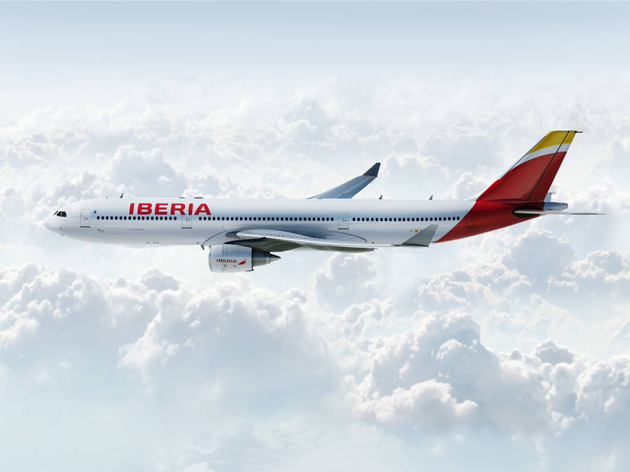 Iberia Airlines Airplane White Cloudy Skies Wallpaper