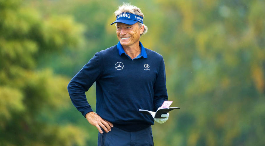 Iconic Golfer Bernhard Langer Flaunting A Winning Smile Wallpaper