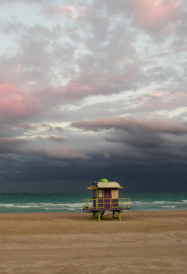 Iconic Lifeguard Tower On Malibu Beach, California Wallpaper