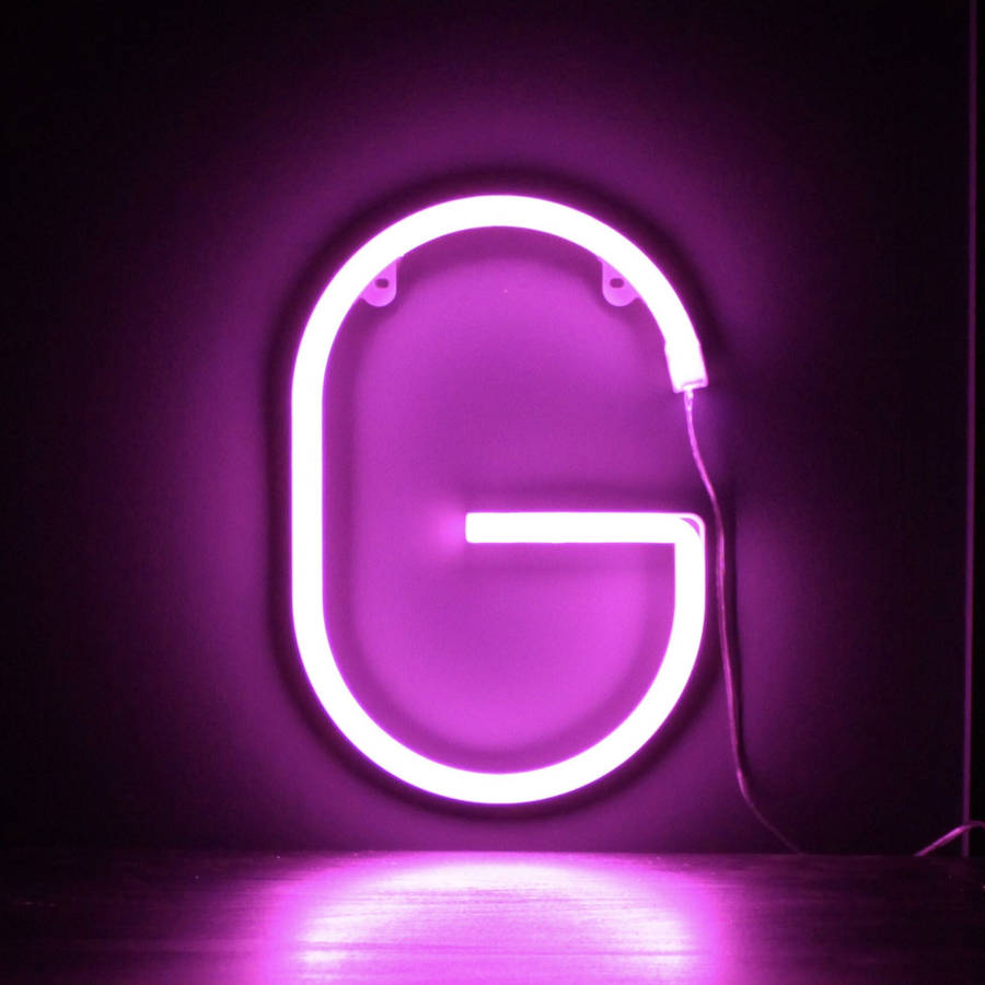 Illuminated Purple Neon Letter G Wallpaper