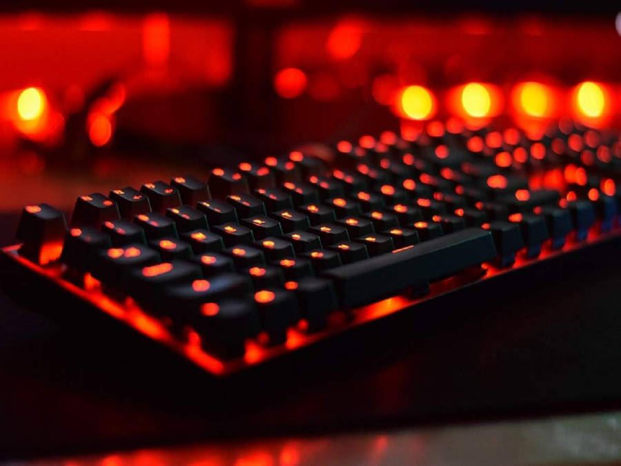 Illuminated Red And Black Computer Keyboard Wallpaper