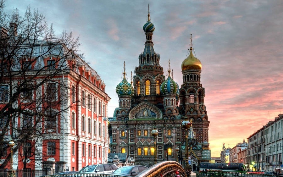 Illuminated Russian Cathedral Under Starry Sky Wallpaper