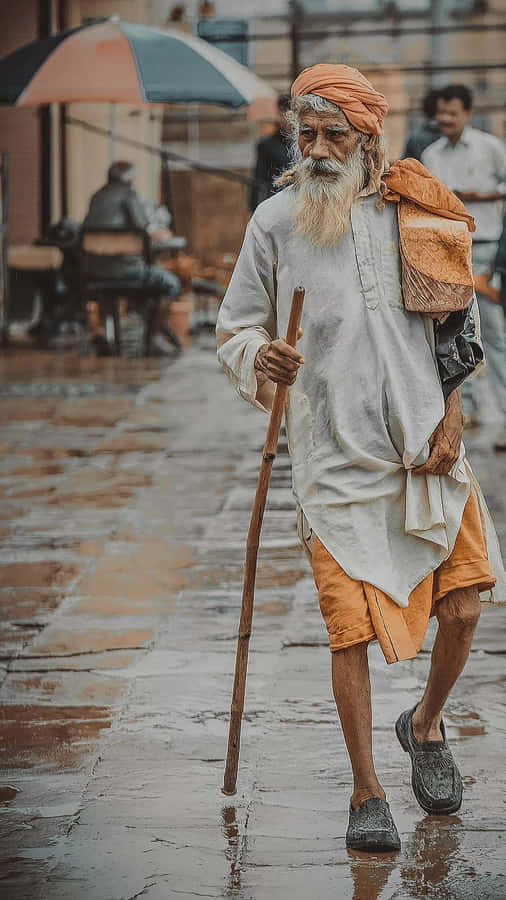 Indian Man With Walking Stick Wallpaper