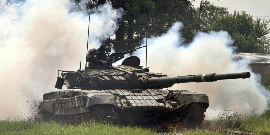 Indian Soldiers On Tank In Trials Wallpaper