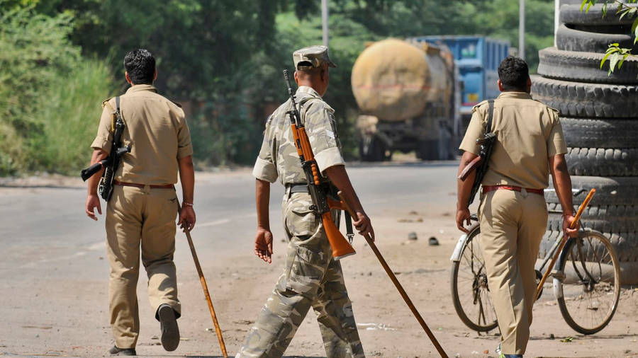 Indian Soldiers With Batons Wallpaper