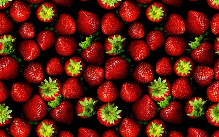 Indulge In The Sweetness Of Stawberries Wallpaper
