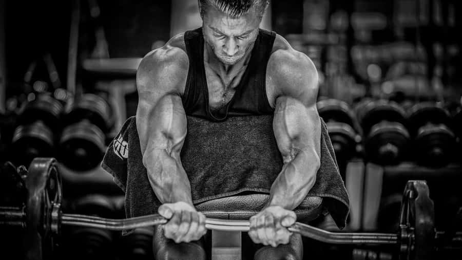 Intense_ Gym_ Workout_ Session Wallpaper