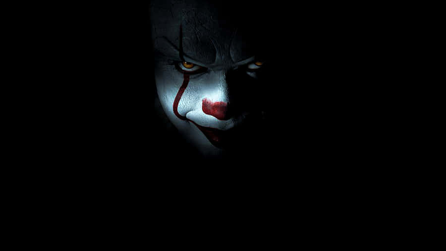 Intimidating_ Clown_in_ Shadows.jpg Wallpaper