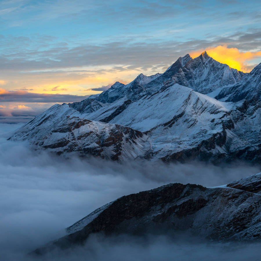 Ipad Pro Snowy Mountain During Sunset Wallpaper