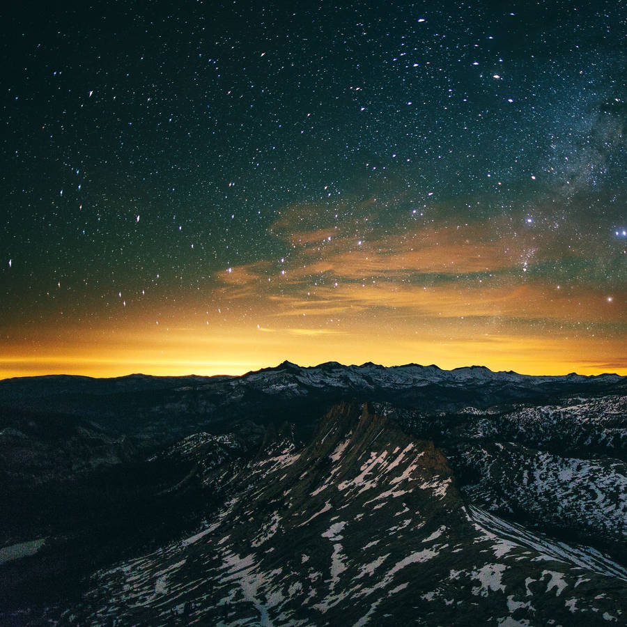 Ipad Pro Starry Sunset On Mountains Wallpaper